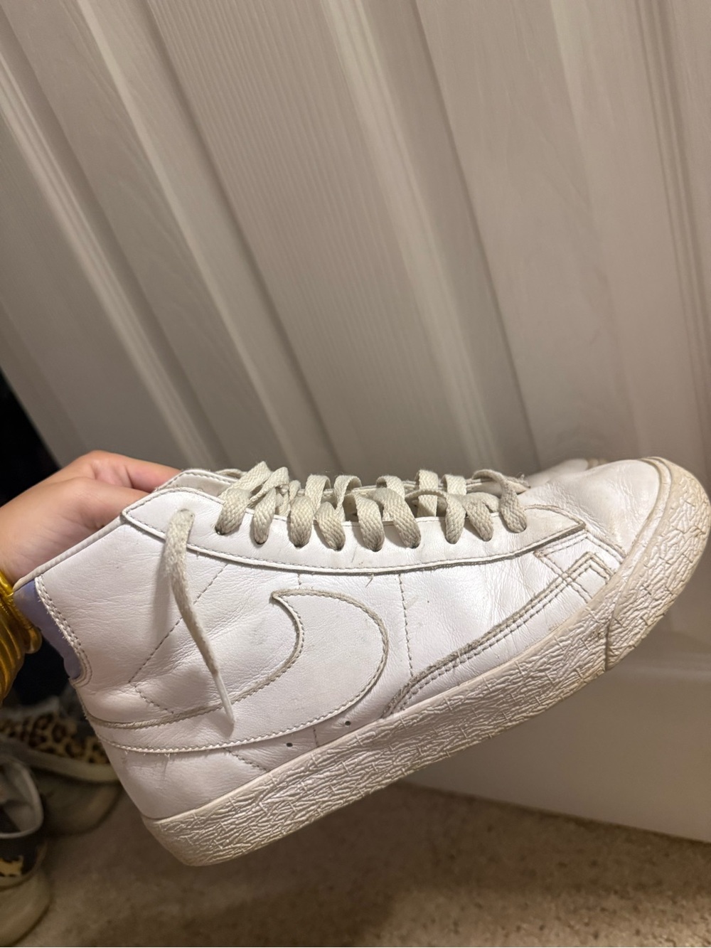 Nike White High-Top Leather Sneaker with Subtle Off-White Details